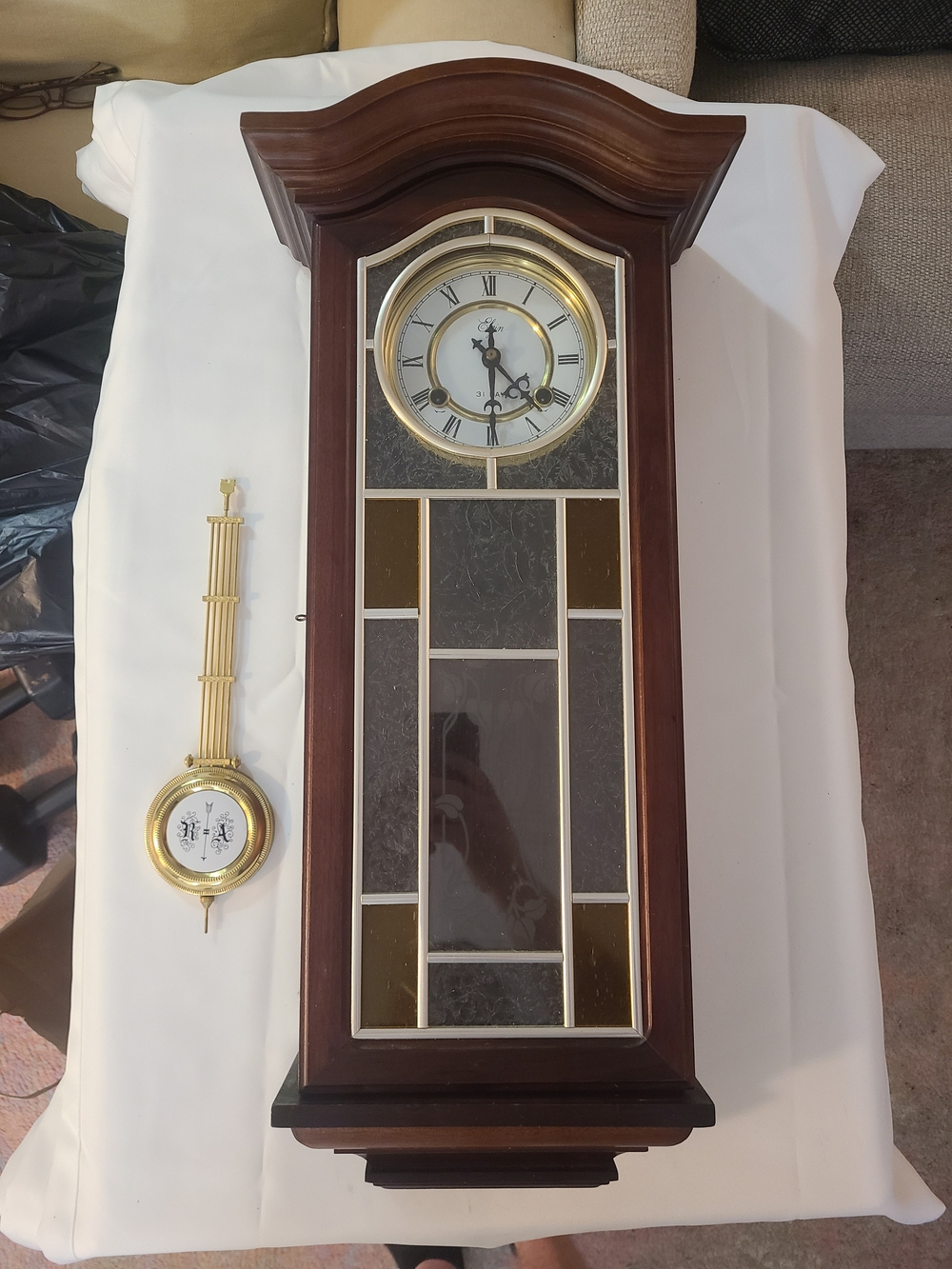 Elgin 31 Day Wooden Wall Chime Clock with Gold Accents - Brown